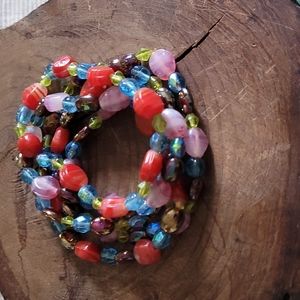 Multi colour stackable set of 5 stretch beaded bracelets